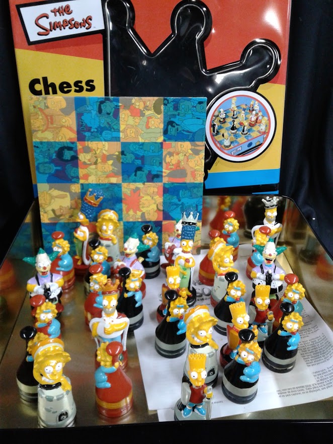 Jeu d'échecs Simpsons avec plateau de jeu pliable laminé